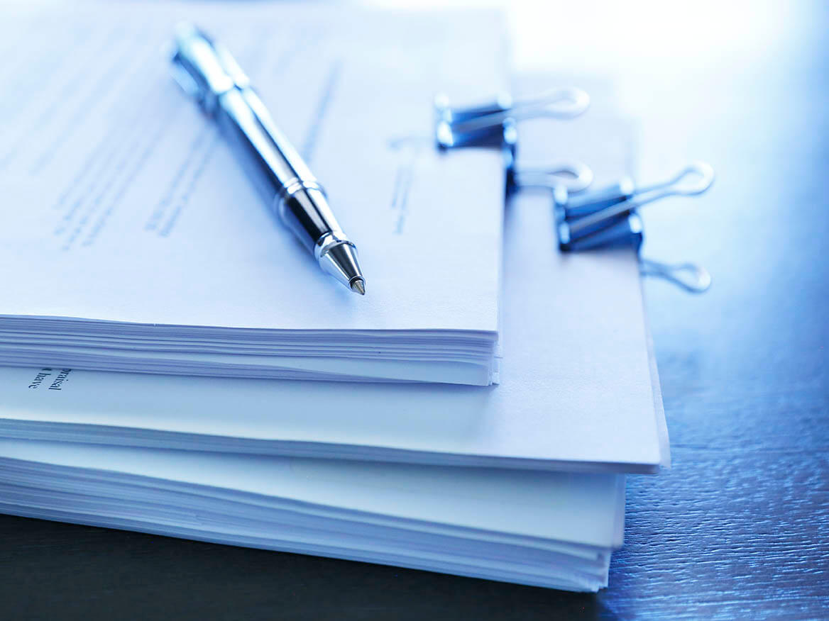 Stack of legal documents that have not been filed for admission of liability.