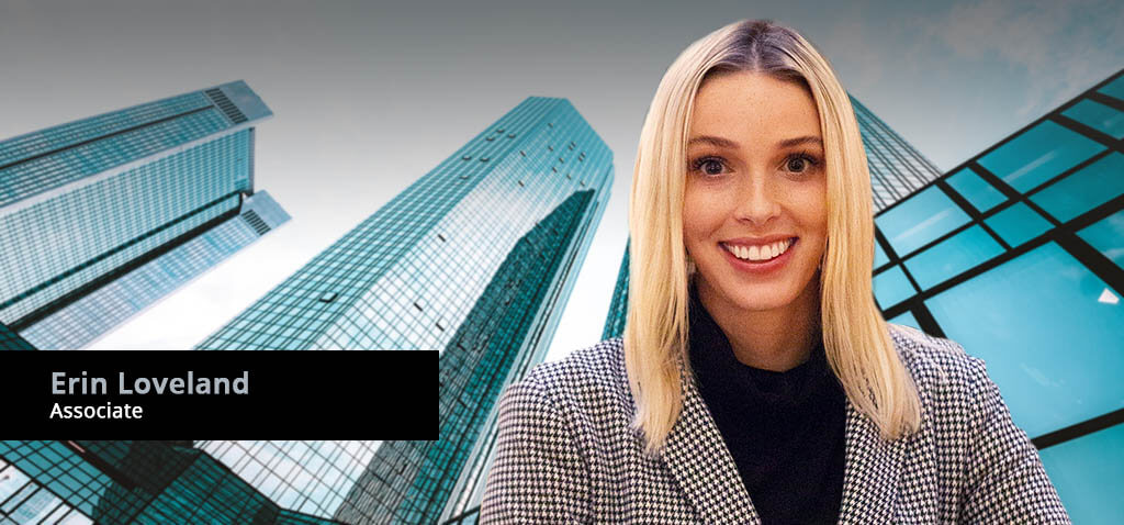 Associate Attorney, Erin Loveland, against modern architecture background.