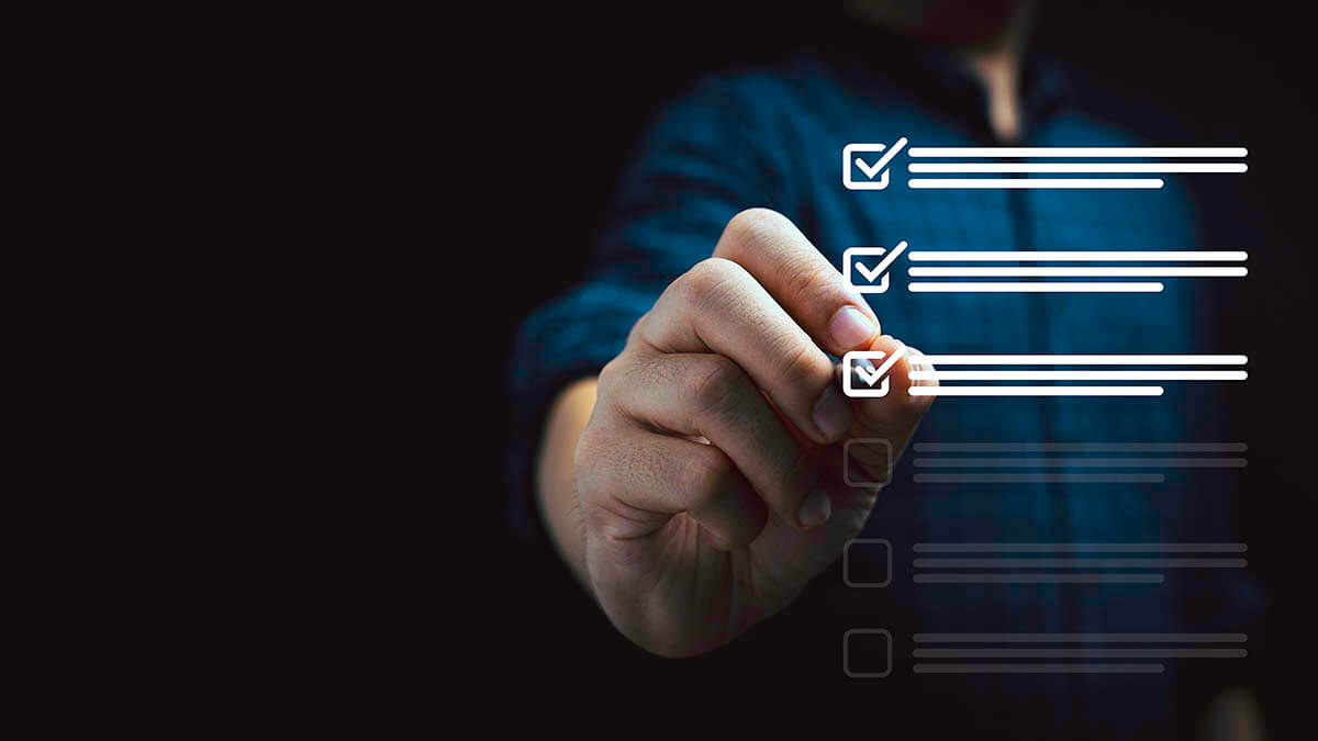 A man checking off a list of items to complete an authorization request that complies with Rule 16 requirements